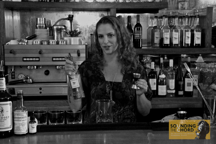 stephanie schneider behind her bar at huckleberry bar august 2011.jpg
